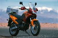 Aprilia Pegaso Tuscany-Tibet Following the Raid theme, longer suspension, higher seat, bigger screen, knobbly tyres, aluminium top box, etc. for those who like it a bit of rough with their smooth.652cc, single cylinder, 49bhp, Ins Grp 9MRP '03 £5,119 OTR. Available Now.