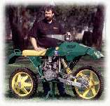 This is the Dryvtech 2x2x2 Experimental, a motorcycle designed and built by Ian Drysdale as a test bed for his ideas on 2 wheel drive and 2 wheel steering.