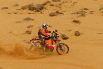 Dakar leader Nani Roma catches his foot in the sand