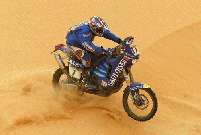 Richard Sainct crests a Dakar dune.